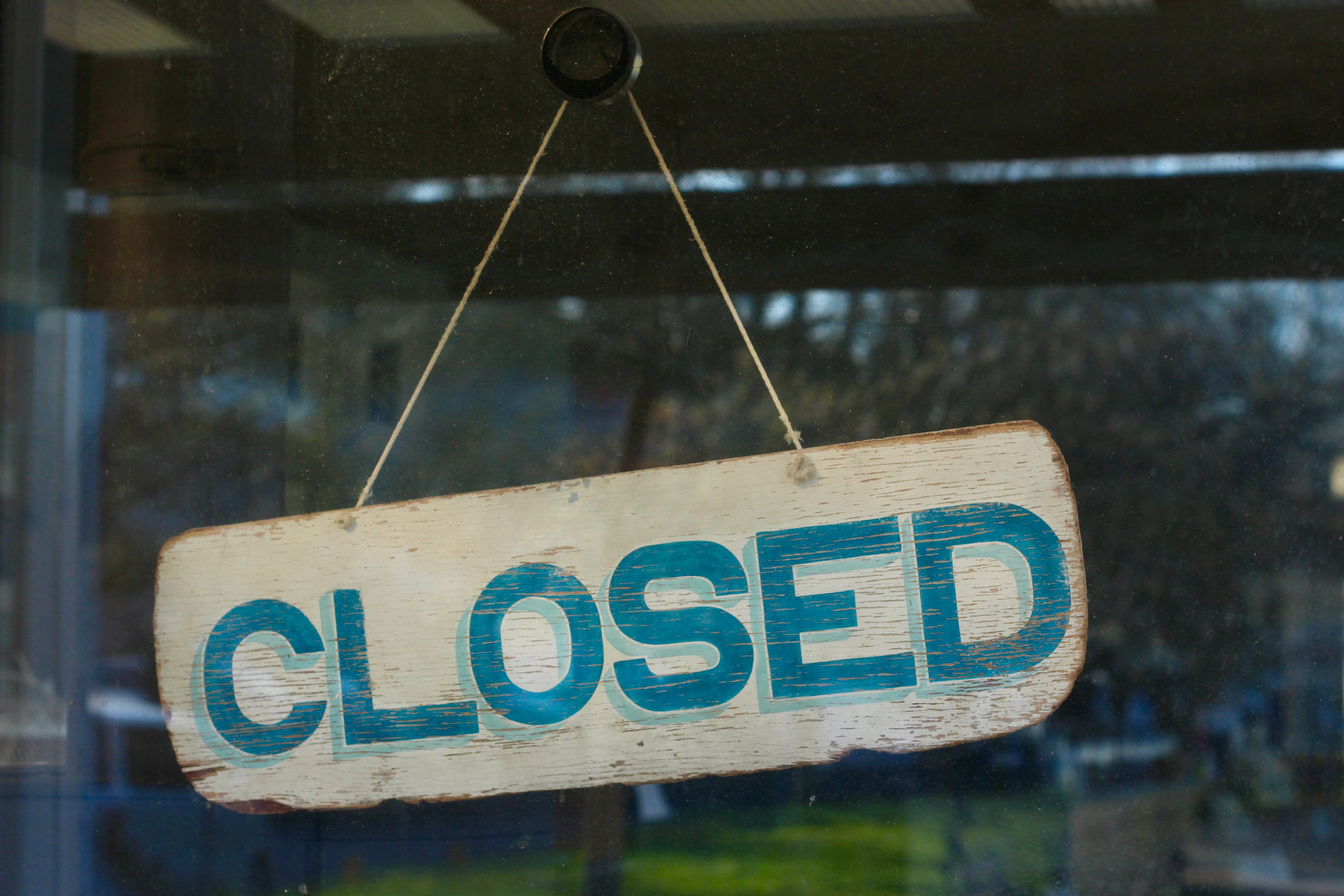 Closed sign in store window